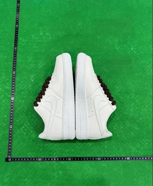 27 (brown shoelaces)